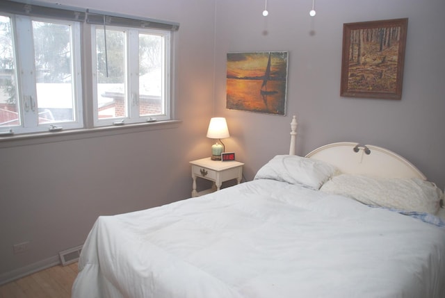 735 Lamon Ave, Wilmette, IL 60091 - bedroom featuring wood finished floors and baseboards
