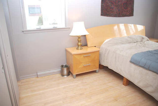735 Lamon Ave, Wilmette, IL 60091 - bedroom featuring light wood-style flooring and baseboards