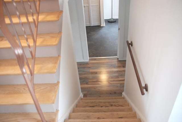 735 Lamon Ave, Wilmette, IL 60091 - staircase with wood finished floors, carpet flooring, and baseboards