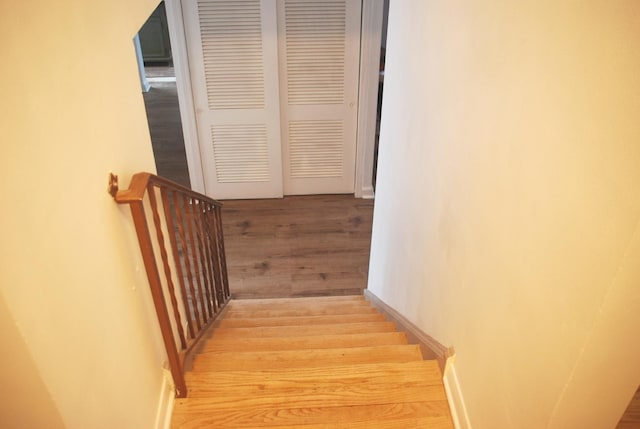 735 Lamon Ave, Wilmette, IL 60091 - stairs featuring wood finished floors and baseboards