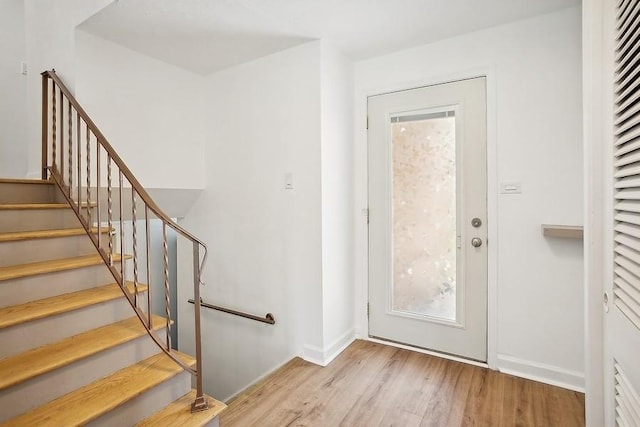 735 Lamon Ave, Wilmette, IL 60091 - entrance foyer featuring wood finished floors, baseboards, and stairway