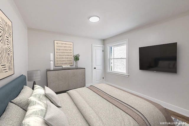 carpeted bedroom with baseboards