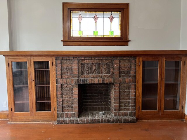 3423 N Tripp Ave, Chicago, IL 60641 - detailed view of wood finished floors and a fireplace
