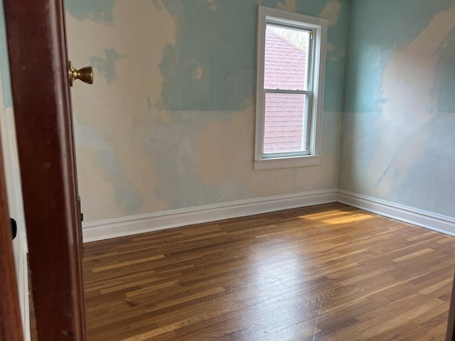 3423 N Tripp Ave, Chicago, IL 60641 - unfurnished room featuring hardwood / wood-style flooring and baseboards