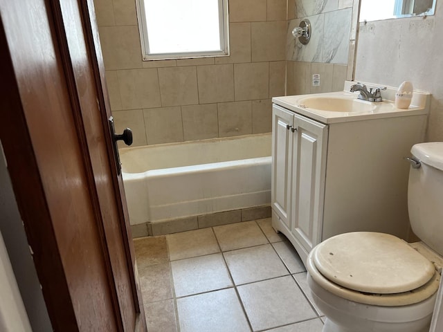 3423 N Tripp Ave, Chicago, IL 60641 - bathroom with toilet, tile patterned floors, vanity, and tub / shower combination