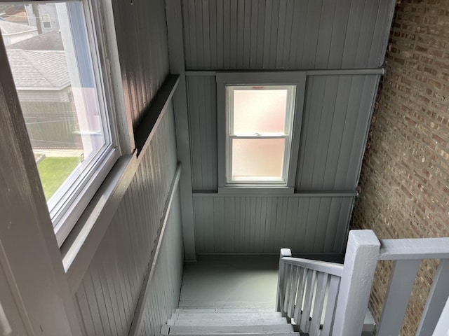 3423 N Tripp Ave, Chicago, IL 60641 - stairway with plenty of natural light and wood walls
