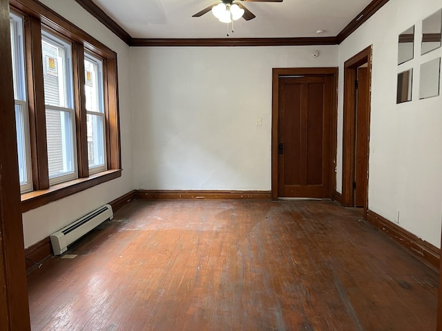 3423 N Tripp Ave, Chicago, IL 60641 - spare room featuring baseboard heating, hardwood / wood-style floors, ornamental molding, a ceiling fan, and baseboards