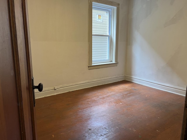 3423 N Tripp Ave, Chicago, IL 60641 - unfurnished room featuring hardwood / wood-style floors and baseboards