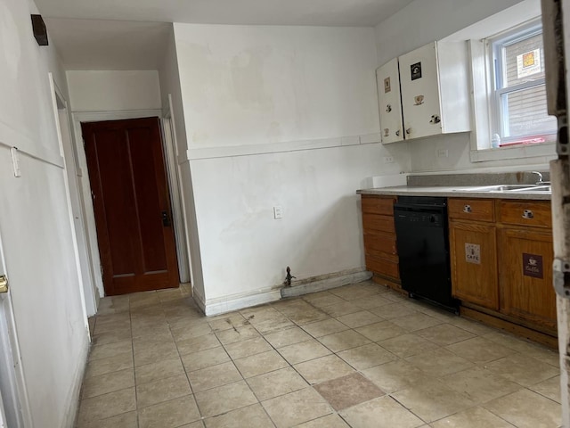 3423 N Tripp Ave, Chicago, IL 60641 - kitchen featuring black dishwasher, brown cabinets, light tile patterned flooring, a sink, and light countertops