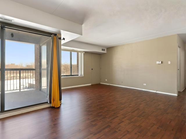500 Park Ave Unit 535, Calumet City, IL 60409 - spare room with dark wood-style flooring and baseboards