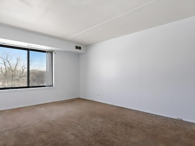 500 Park Ave Unit 535, Calumet City, IL 60409 - empty room featuring baseboards and carpet flooring