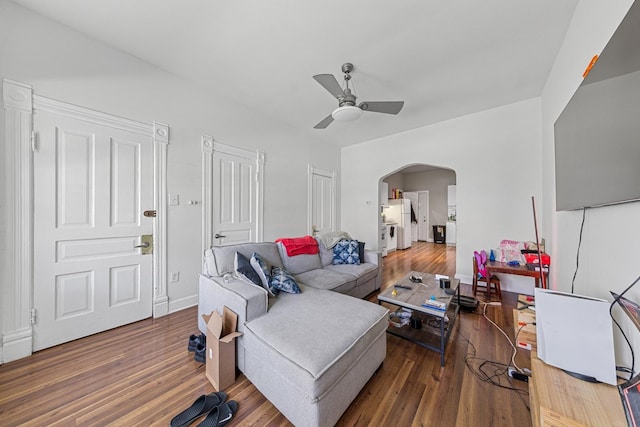 2443 N Marshfield Ave, Chicago, IL 60614 - living room with arched walkways, ceiling fan, and wood finished floors