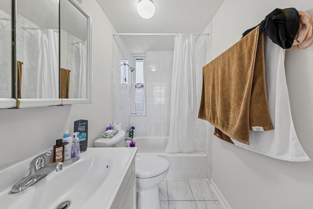 2443 N Marshfield Ave, Chicago, IL 60614 - bathroom featuring toilet, shower / tub combo, marble look tile flooring, and vanity