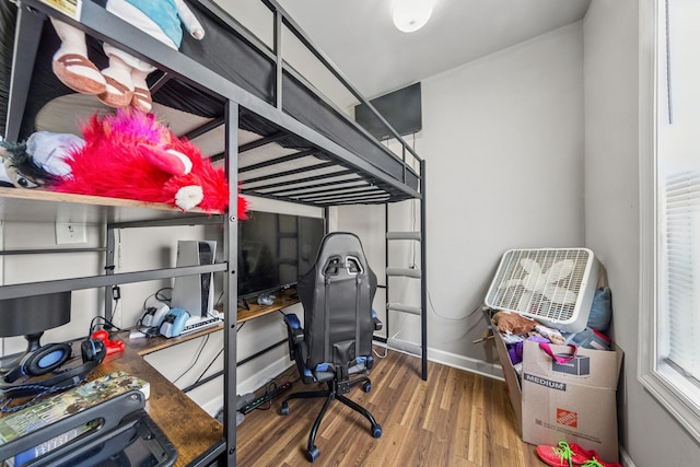 2443 N Marshfield Ave, Chicago, IL 60614 - bedroom with wood finished floors and baseboards