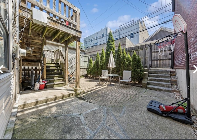 2443 N Marshfield Ave, Chicago, IL 60614 - fenced backyard featuring stairs, entry steps, and a patio area