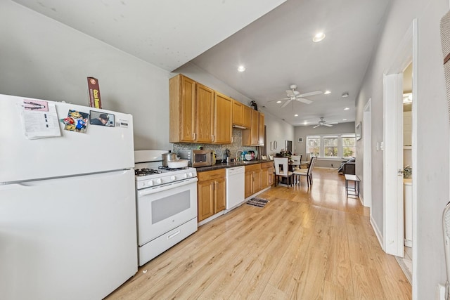 2443 N Marshfield Ave, Chicago, IL 60614 - kitchen featuring white appliances, a ceiling fan, light wood-type flooring, recessed lighting, and dark countertops