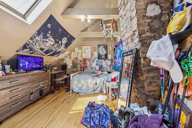 2443 N Marshfield Ave, Chicago, IL 60614 - bedroom with hardwood / wood-style flooring, a skylight, and lofted ceiling