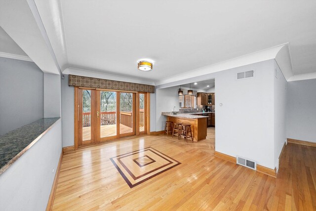 16608 W 135th St, Lemont, IL 60439 - living area featuring ornamental molding, light wood-type flooring, and baseboards
