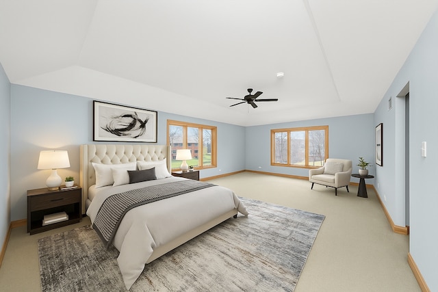 16608 W 135th St, Lemont, IL 60439 - carpeted bedroom featuring baseboards, a tray ceiling, and ceiling fan