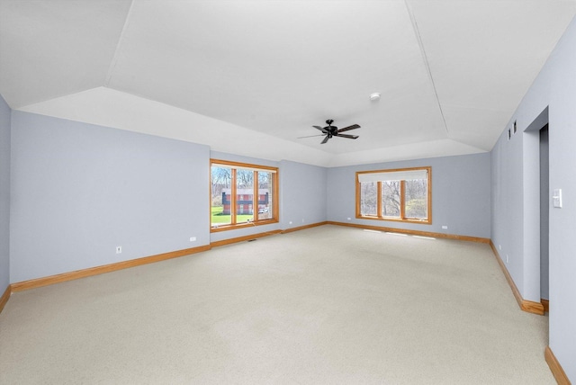 16608 W 135th St, Lemont, IL 60439 - spare room with light colored carpet, baseboards, ceiling fan, plenty of natural light, and lofted ceiling