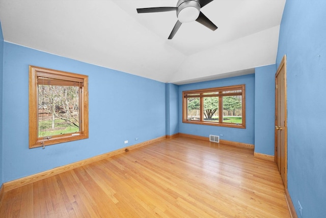 16608 W 135th St, Lemont, IL 60439 - empty room with light wood-style floors, baseboards, vaulted ceiling, and ceiling fan