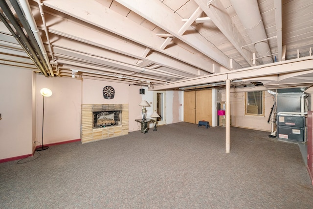 16608 W 135th St, Lemont, IL 60439 - finished below grade area featuring heating unit, carpet, a fireplace, and baseboards