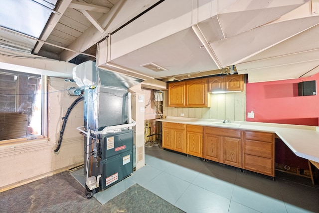 16608 W 135th St, Lemont, IL 60439 - kitchen featuring a sink, heating unit, and light countertops