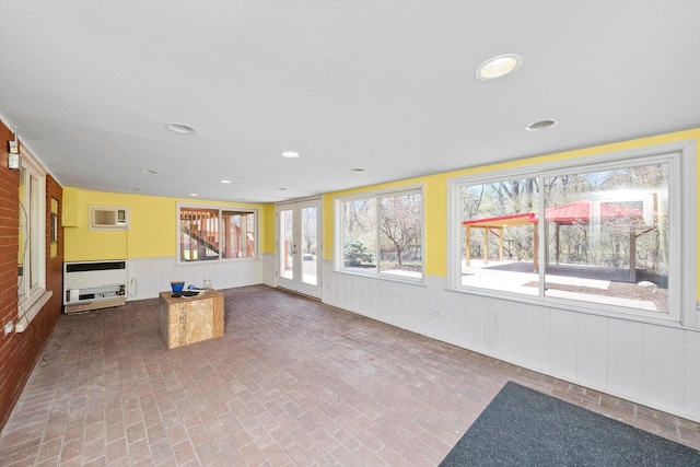 16608 W 135th St, Lemont, IL 60439 - unfurnished sunroom with brick patterned floors, a wainscoted wall, recessed lighting, heating unit, and french doors