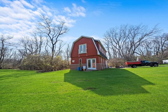 16608 W 135th St, Lemont, IL 60439 - view of side of property with a gambrel roof, a lawn, and french doors