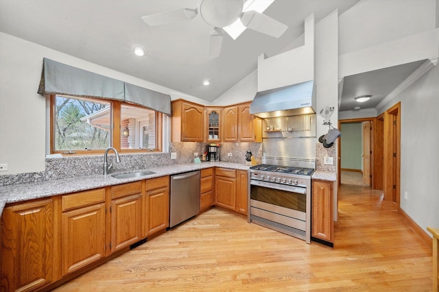 16608 W 135th St, Lemont, IL 60439 - kitchen with appliances with stainless steel finishes, a sink, wall chimney exhaust hood, light wood-style flooring, and brown cabinets