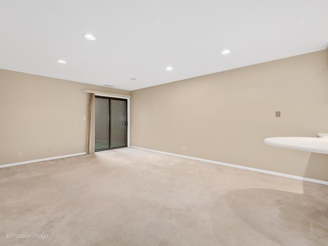 1409 Burr Oak Rd Unit 109A, Hinsdale, IL 60521 - spare room with light carpet, baseboards, and recessed lighting