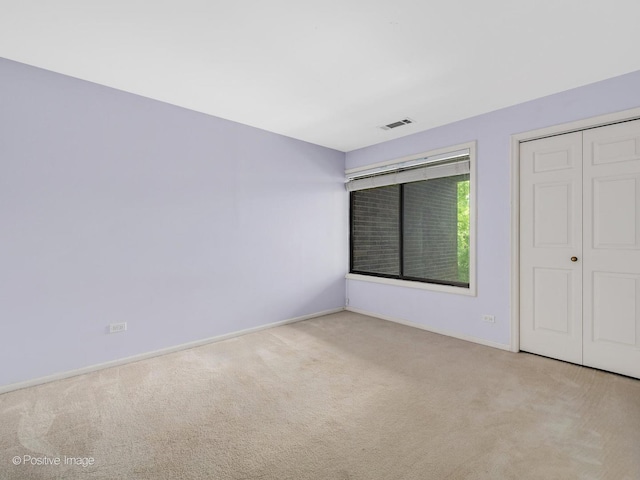 1409 Burr Oak Rd Unit 109A, Hinsdale, IL 60521 - unfurnished bedroom with carpet, baseboards, and a closet
