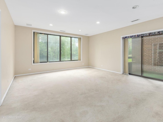 1409 Burr Oak Rd Unit 109A, Hinsdale, IL 60521 - carpeted empty room with baseboards and recessed lighting