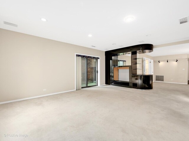 1409 Burr Oak Rd Unit 109A, Hinsdale, IL 60521 - unfurnished living room with baseboards, light colored carpet, and recessed lighting