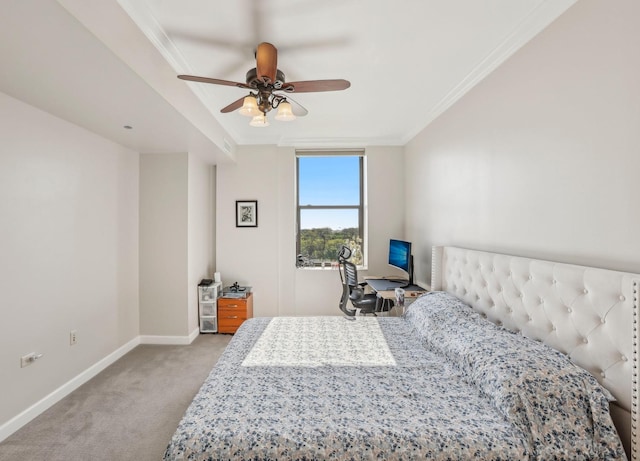 bedroom with light colored carpet, crown molding, baseboards, and ceiling fan