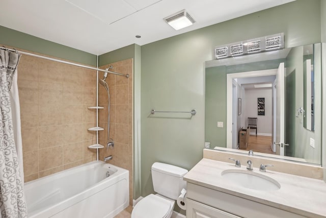 full bath featuring shower / tub combo, toilet, and vanity