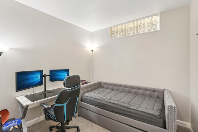 carpeted bedroom with baseboards