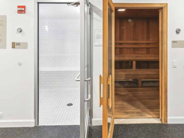 relaxing sauna featuring baseboards