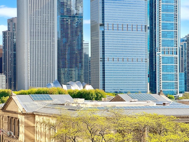 view of building exterior featuring a view of city