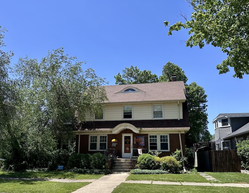 407 4th Ave, Ottawa, IL 61350 - view of front of home with a chimney and brick siding