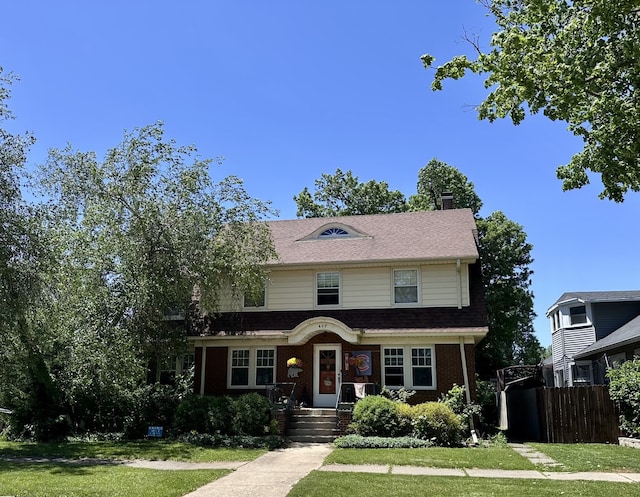 407 4th Ave, Ottawa, IL 61350 - view of front of home with a chimney and brick siding