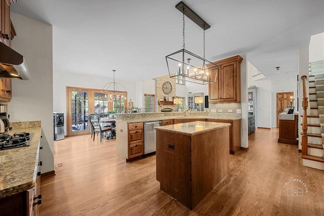 3722 Saint Germain Pl, Saint Charles, IL 60175 - kitchen featuring a chandelier, dishwasher, black gas stovetop, and a peninsula