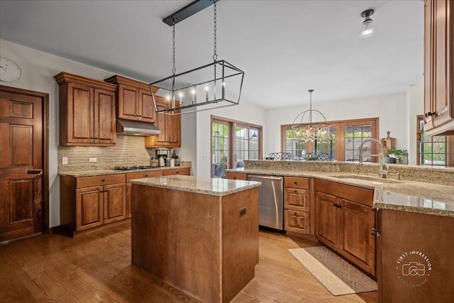 3722 Saint Germain Pl, Saint Charles, IL 60175 - kitchen featuring stainless steel dishwasher, a sink, wood finished floors, brown cabinets, and gas cooktop