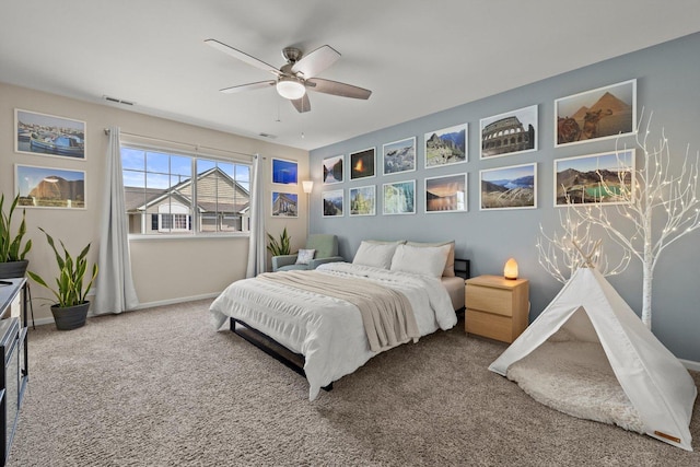 698 S Jade Ln Unit 698, Round Lake, IL 60073 - bedroom with carpet flooring, baseboards, and ceiling fan