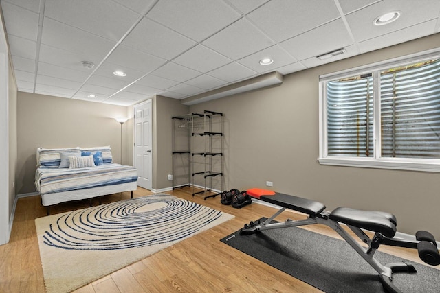 698 S Jade Ln Unit 698, Round Lake, IL 60073 - workout area featuring wood finished floors, recessed lighting, a drop ceiling, and baseboards