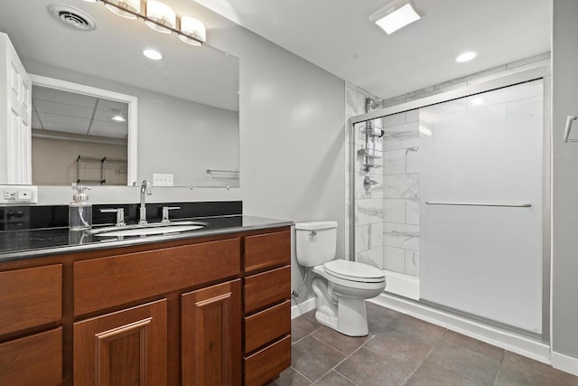 698 S Jade Ln Unit 698, Round Lake, IL 60073 - bathroom featuring toilet, a stall shower, vanity, recessed lighting, and baseboards