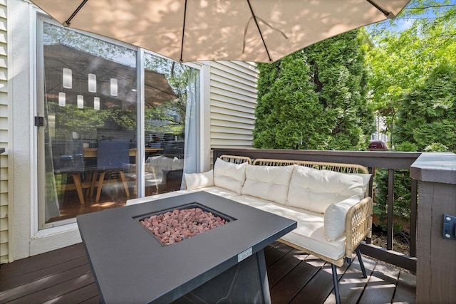 698 S Jade Ln Unit 698, Round Lake, IL 60073 - deck featuring an outdoor living space with a fire pit