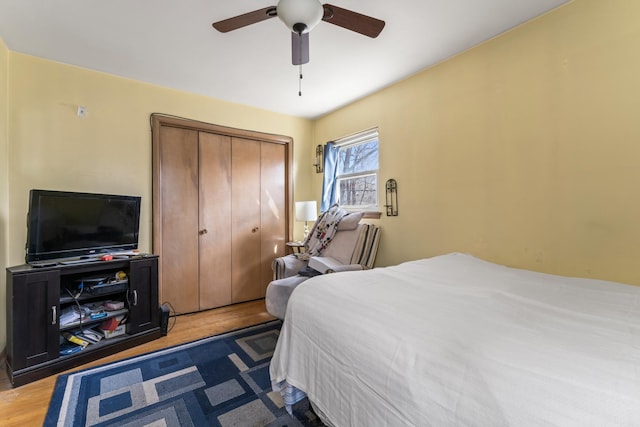 733 E 90th St, Chicago, IL 60619 - bedroom featuring wood finished floors, a closet, and ceiling fan
