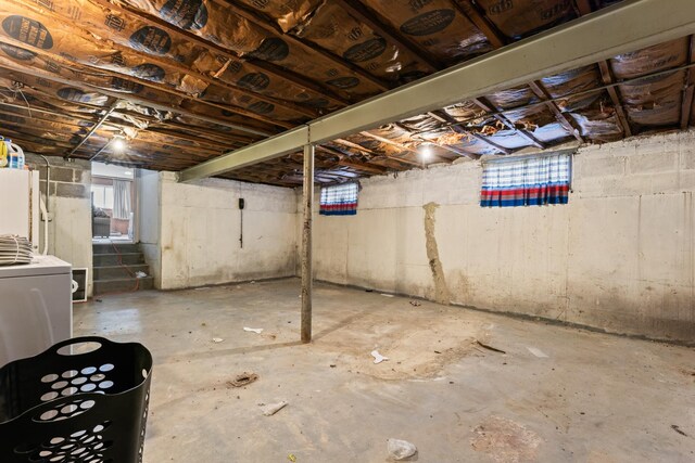 733 E 90th St, Chicago, IL 60619 - below grade area with fridge and washer / clothes dryer
