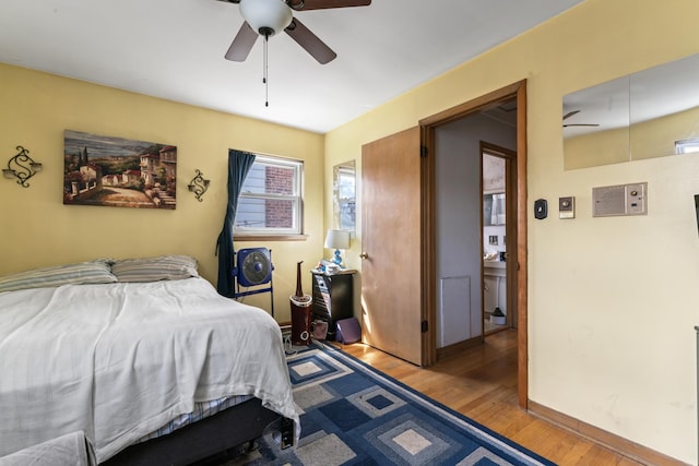 733 E 90th St, Chicago, IL 60619 - bedroom with wood finished floors, baseboards, and ceiling fan